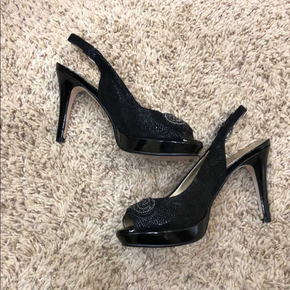 Antonio Melani black sling back heels.
